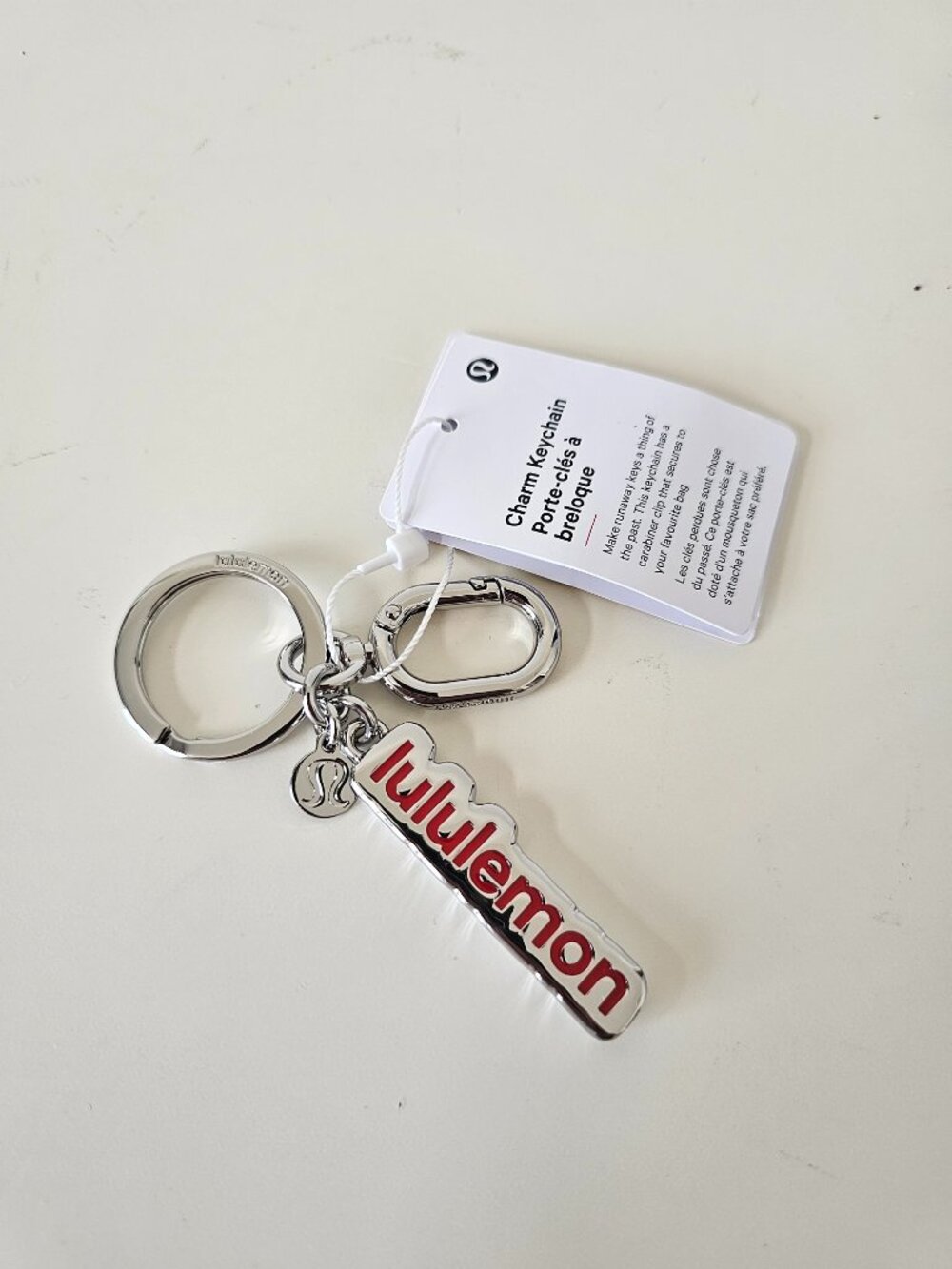 NWT LULULEMON LURD/SLVR Red Silver Metal Charm Keychain One Size OS